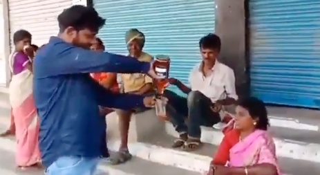 మద్యం దానం చేసినందుకు వ్యక్తి అరెస్ట్, Man arrested for distributing alcohol